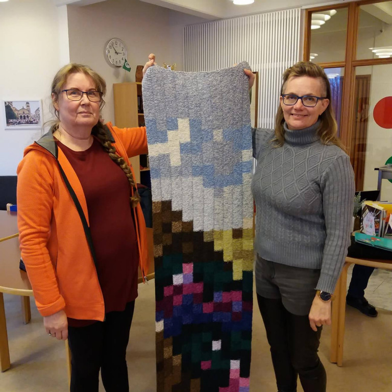 Á myndinni má sjá bút af verkefninu í höndum hönnuða og skipuleggjenda verkefnisins.